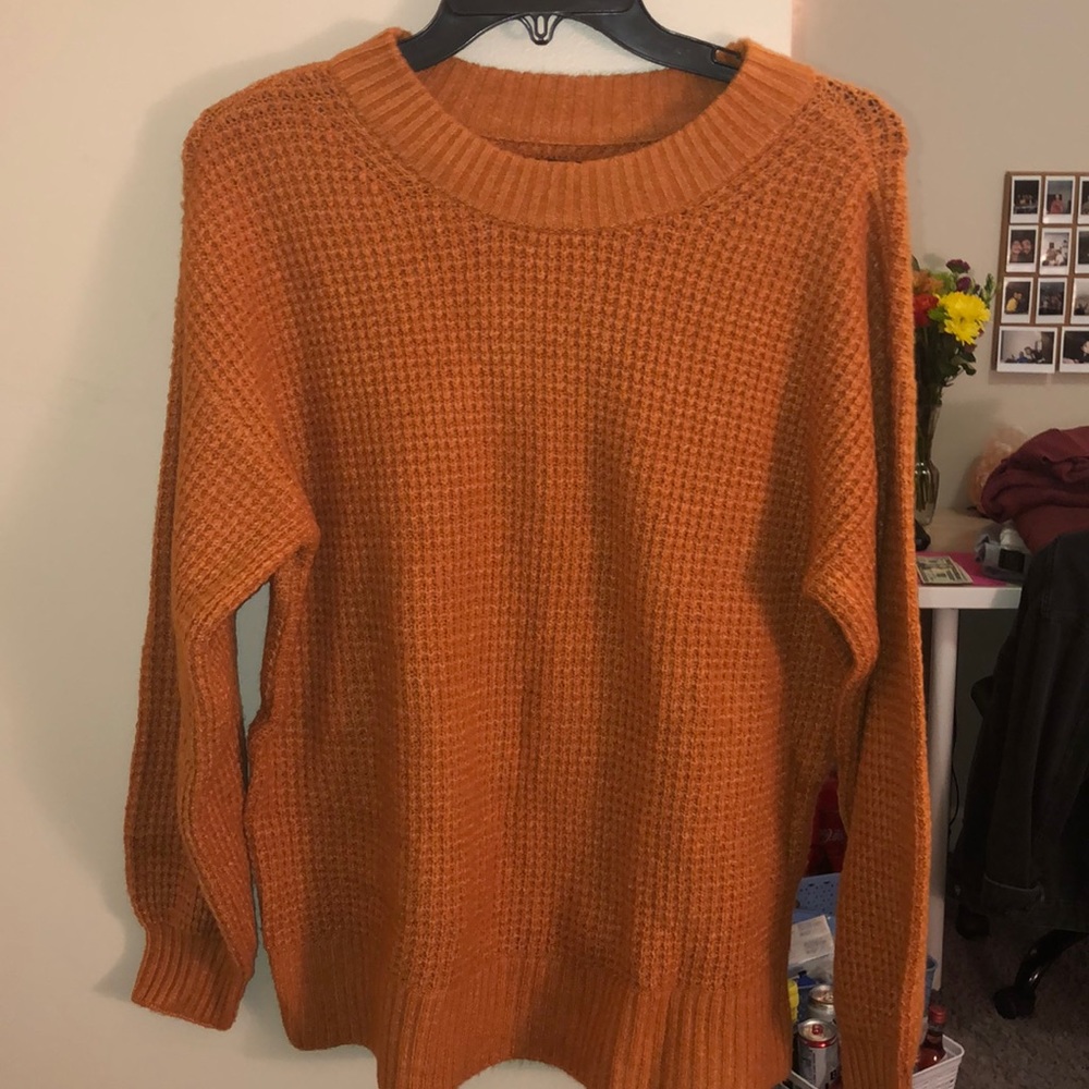 thick orange sweater